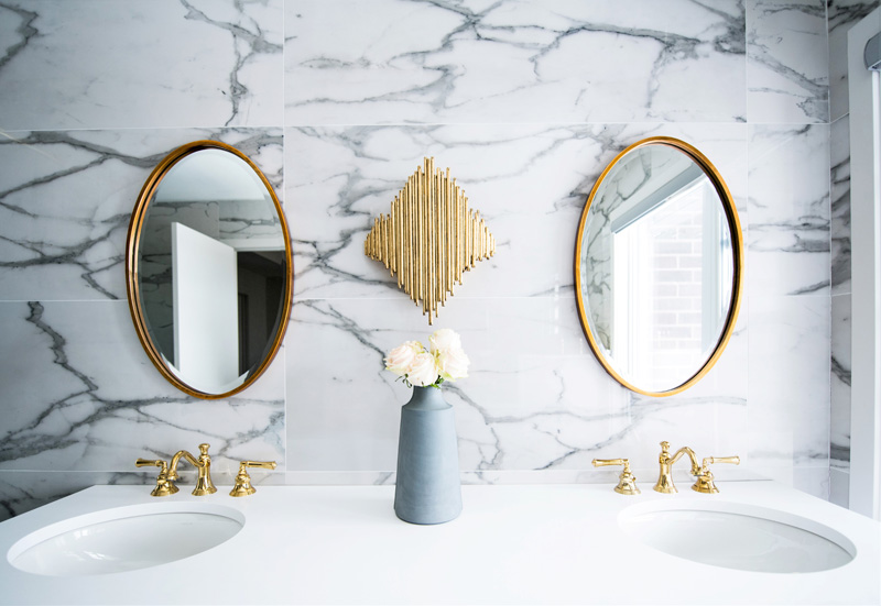 Gold accents and plumbing fixtures - Bathroom Trends for 2023